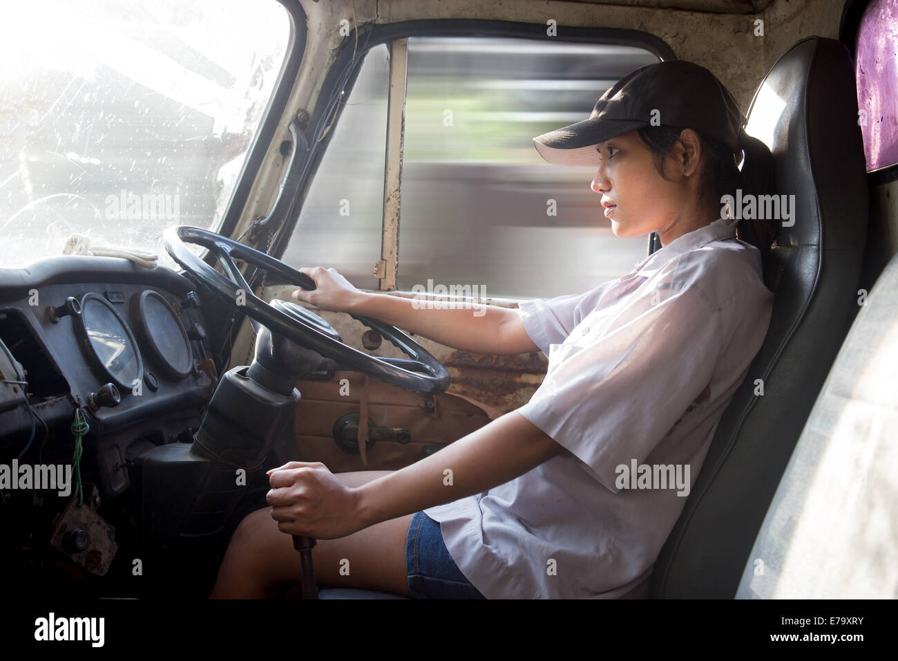 young woman driving a truck Stock Photo