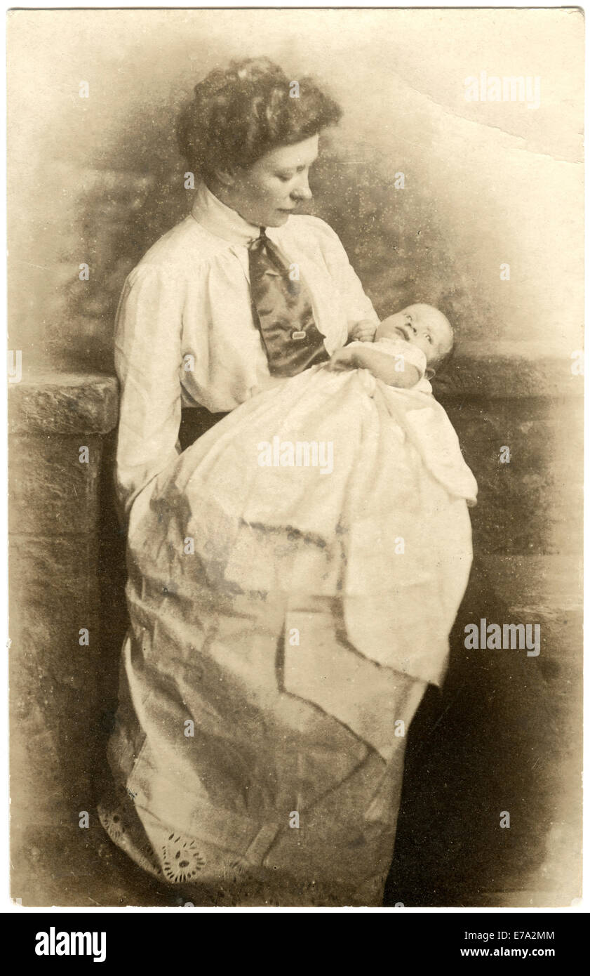 Mother Holding Infant, circa 1910 Stock Photo