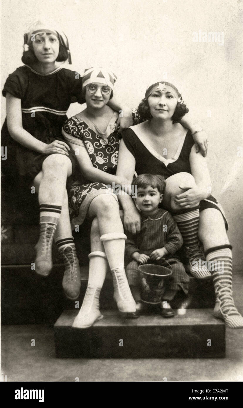 Three Young Women in Bathing Suits with Small Boy, Portrait, circa 1910 Stock Photo