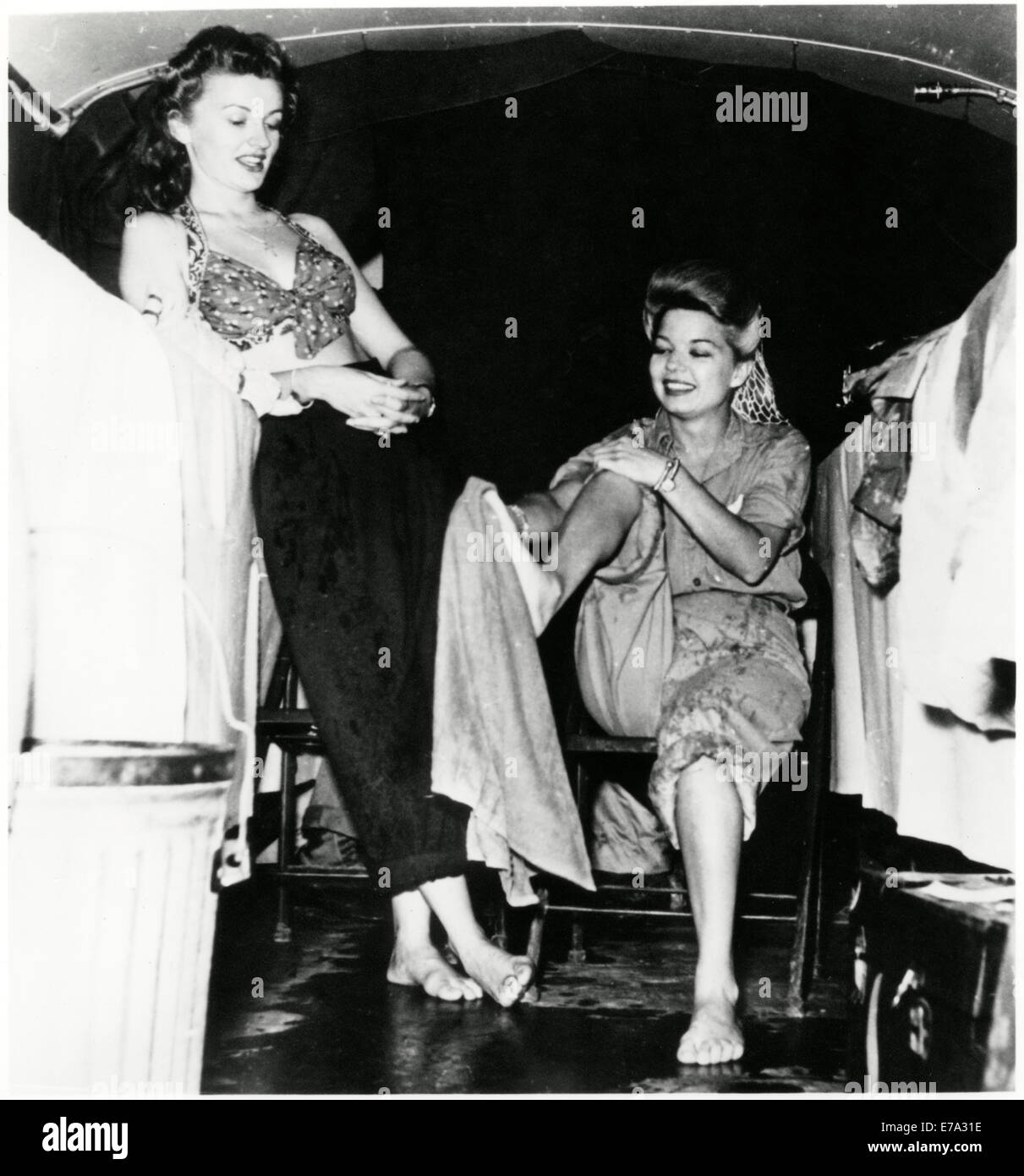 Patty Thomas (L) and Francis Langford relaxing While Part of Bob Hope's World War II Troupe of Performers, early 1940's Stock Photo