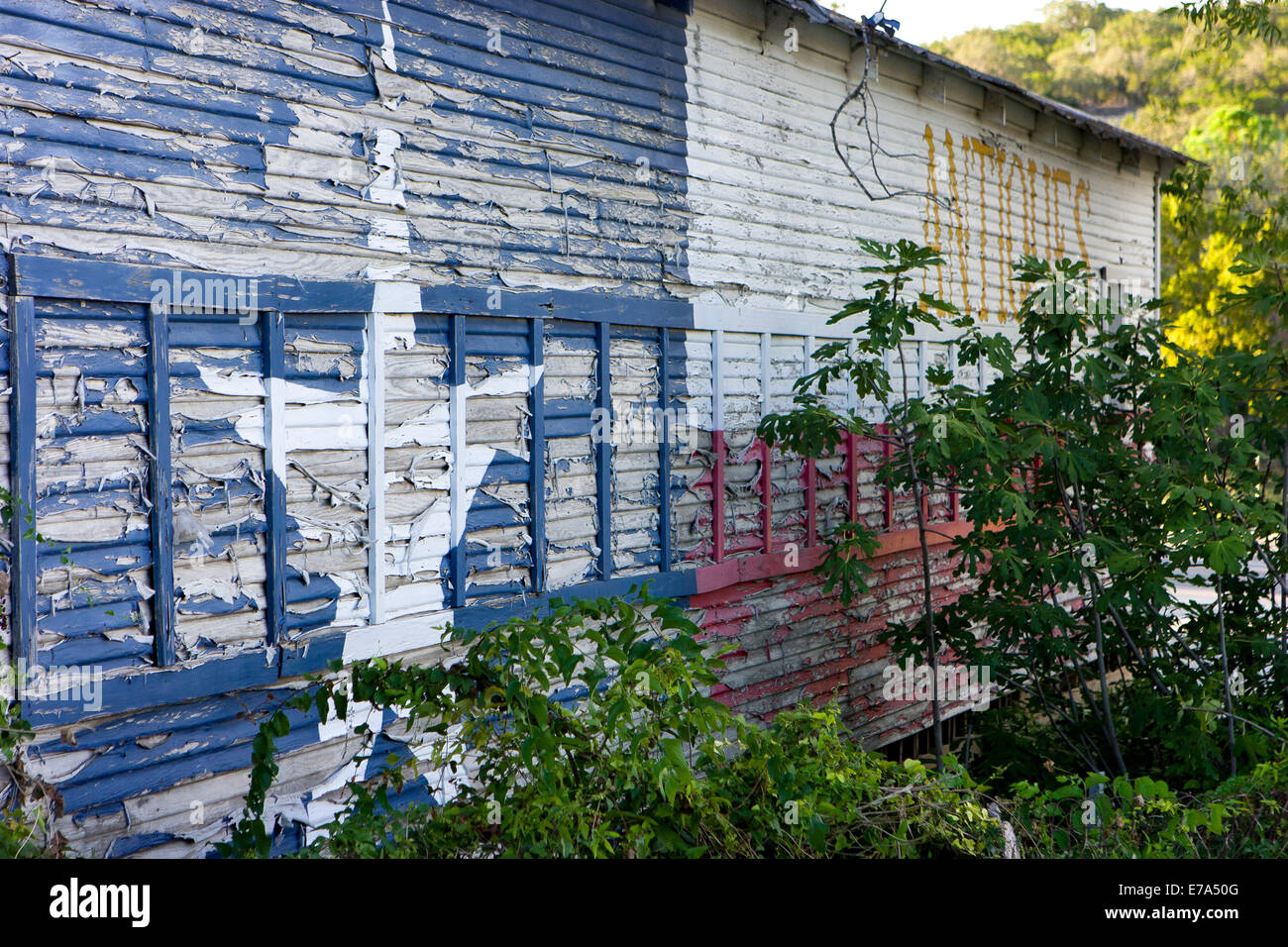 Abandoned antique store with Texas flag paint, Pipe Creek Texas Stock ...