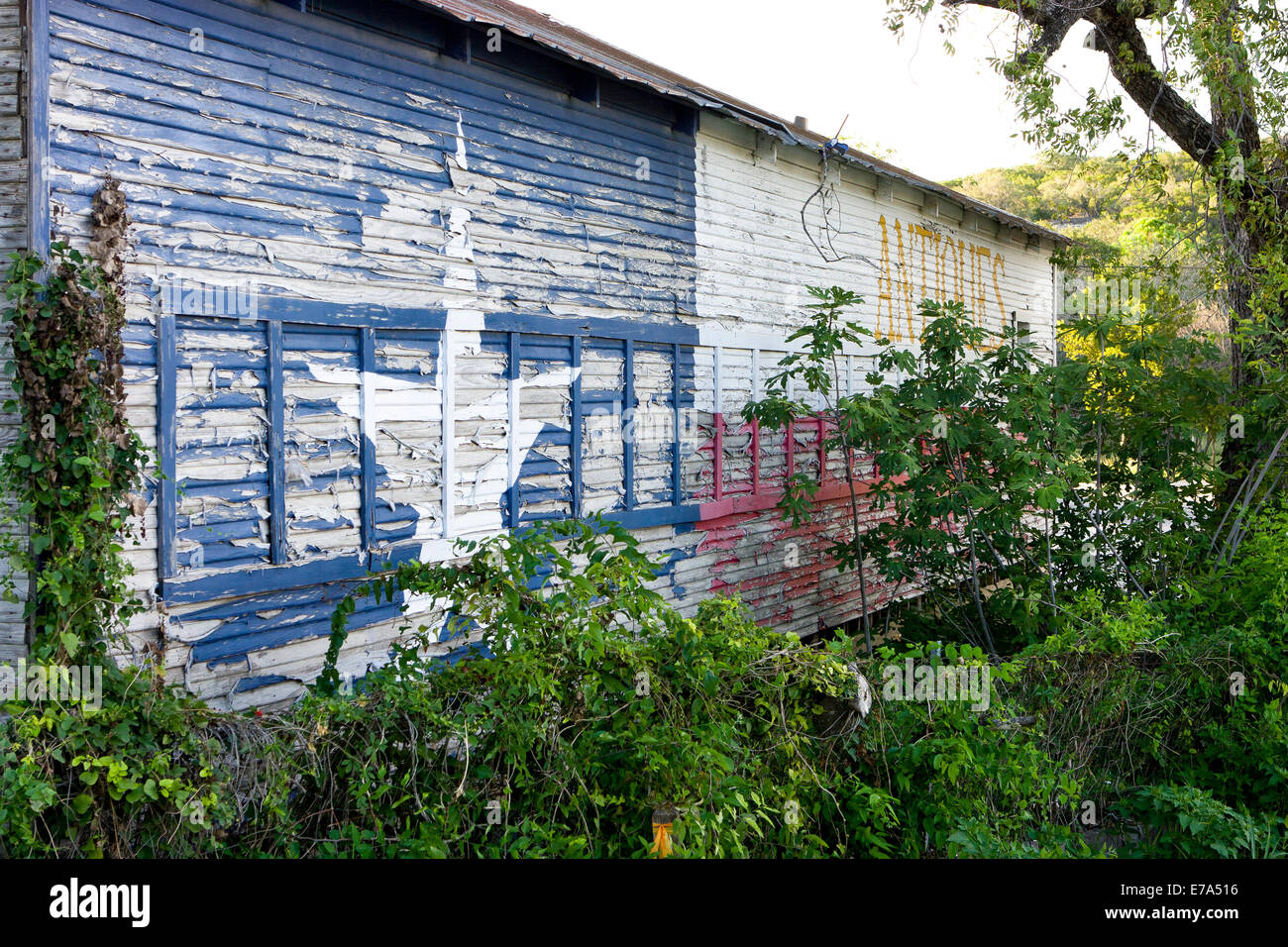 Abandoned antique store with Texas flag paint, Pipe Creek Texas Stock ...