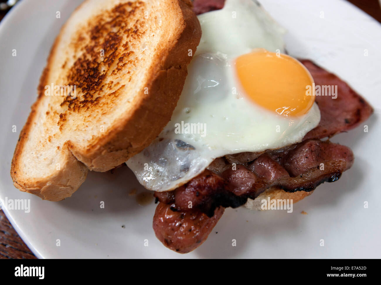 Bacon sausage and egg sandwich Stock Photo Alamy