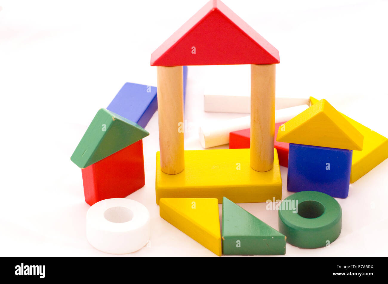 A preschool construction wood game with pieces of different colours. Stock Photo