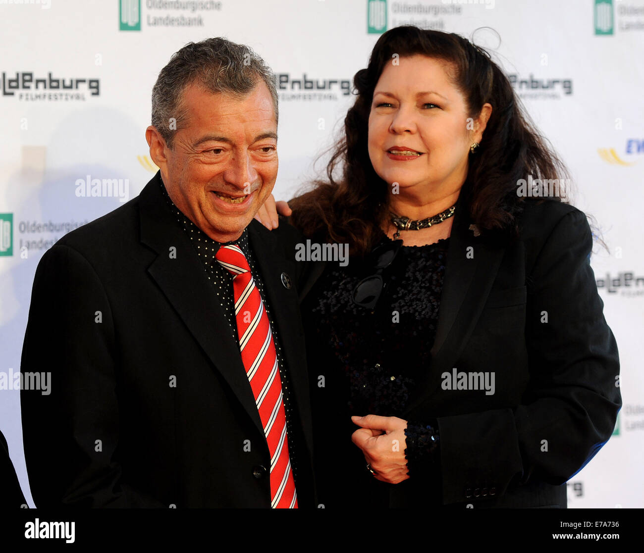 Australian director and guest of honor, Philippe Mora, arrives with his wife Pamela on the red carpet at the Oldenburg Film Festival in Oldenburg, Germany, 10 September 2014. It is the 21st Oldenburg Film Festival. Photo: INGO WAGNER/dpa Stock Photo