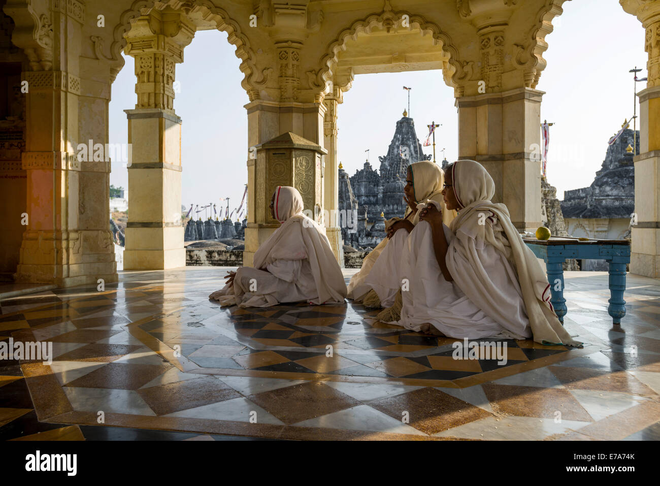 Jain nuns praying in a temple, Palitana temples, Mount Shatrunjaya, Palitana, Gujarat, India Stock Photo