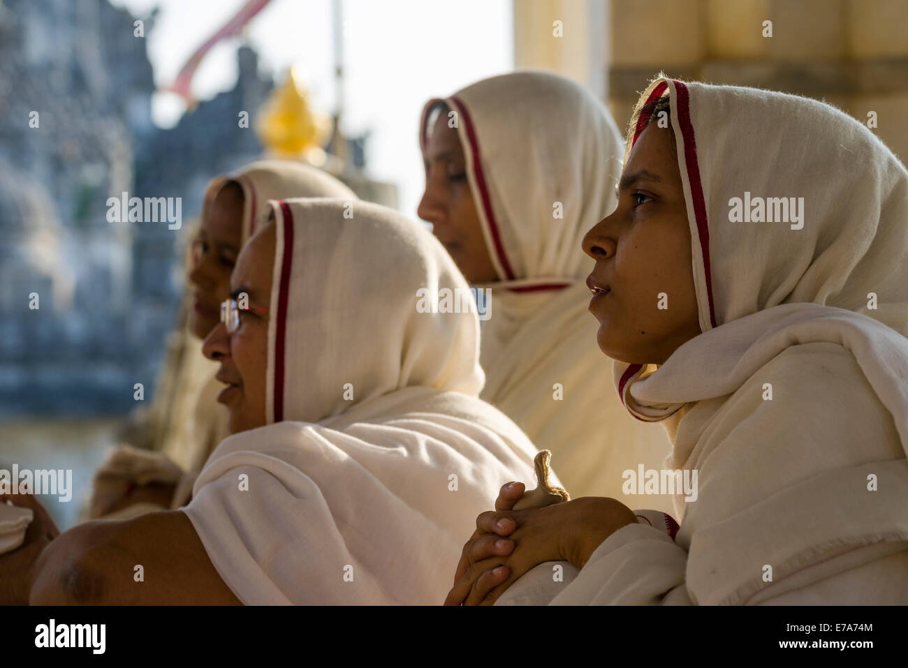 Jain nuns in a temple, Palitana temples, Mount Shatrunjaya, Palitana, Gujarat, India Stock Photo