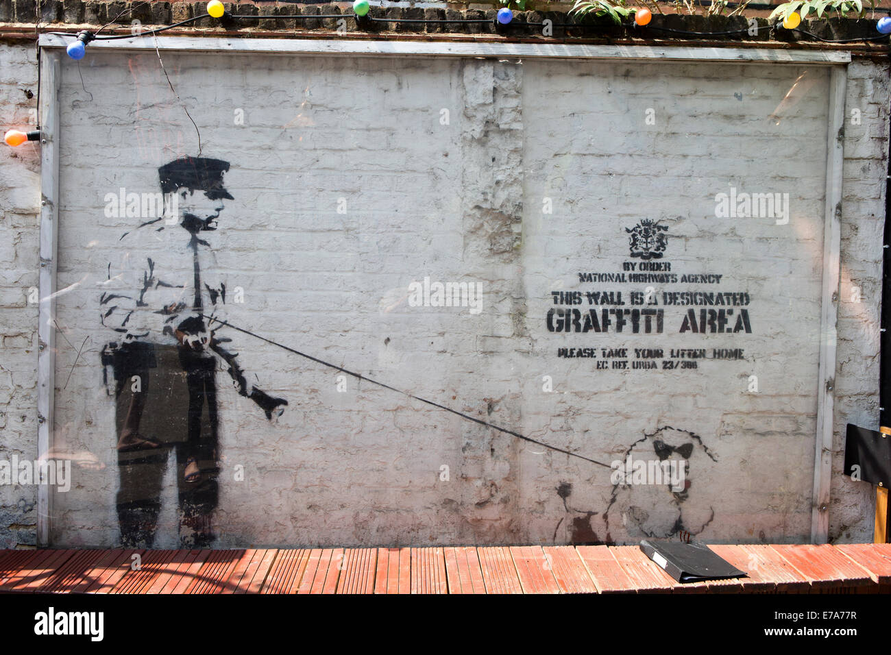 Banksy Stencil Graffiti outside the Cargo Club, Rivington Street, Shoreditch, London, England, UK. Stock Photo