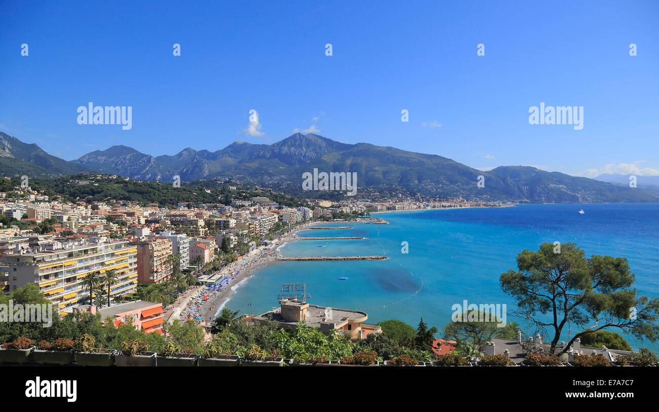 Beach of Carnolès, looking towards Menton and the ridge of the border to Italy, Roquebrune Cap Martin, Maritime Alps Stock Photo