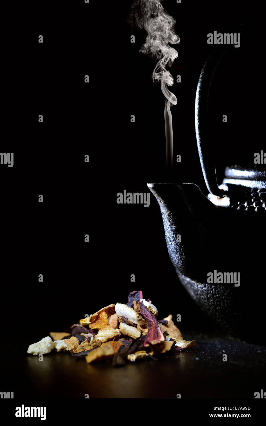 Iron Teapot over black background Stock Photo