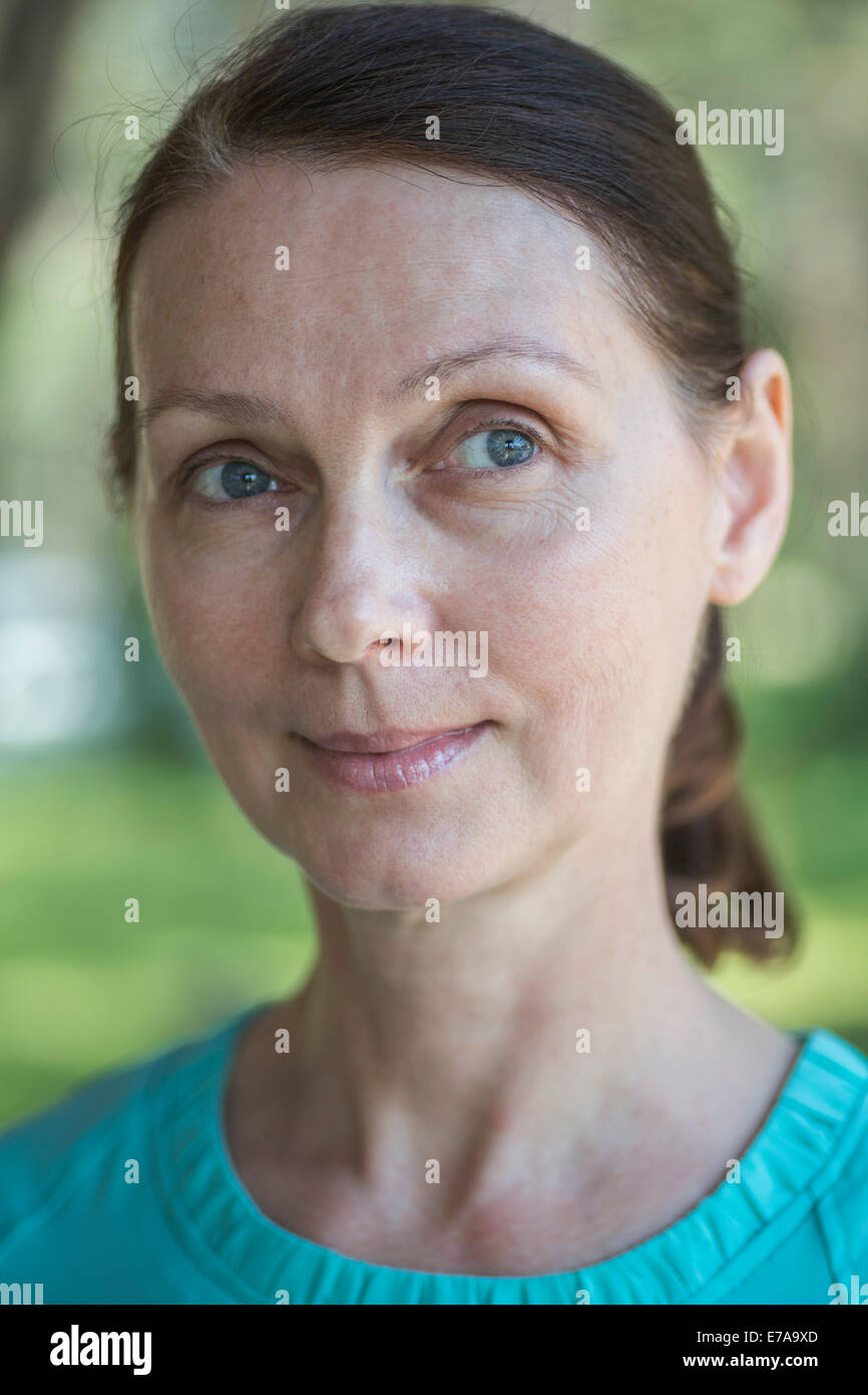 Close-up of thoughtful mature woman at park Stock Photo
