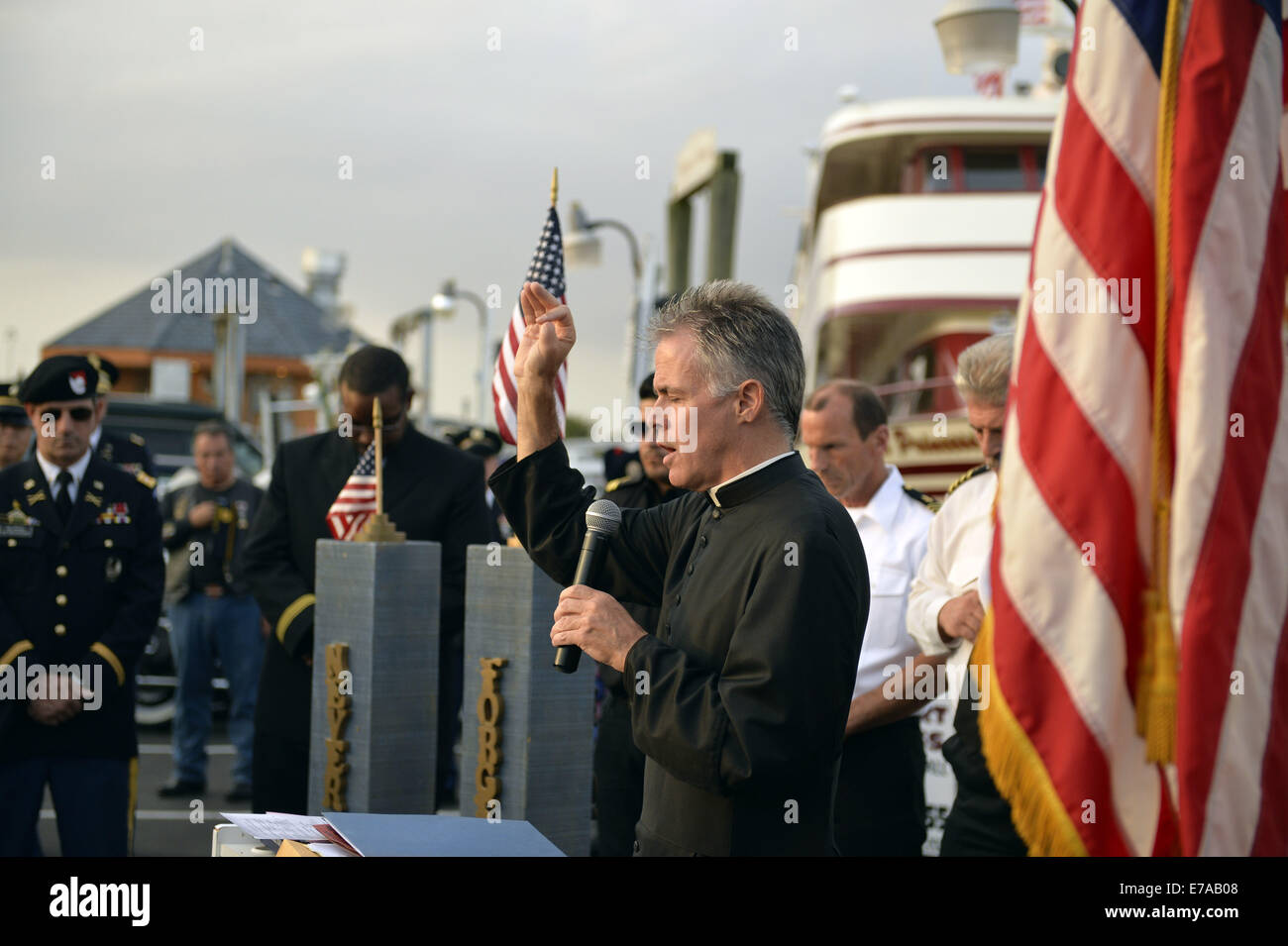 Freeport, New York, USA. 10th Sep, 2014. A pastor gives a blessing at a