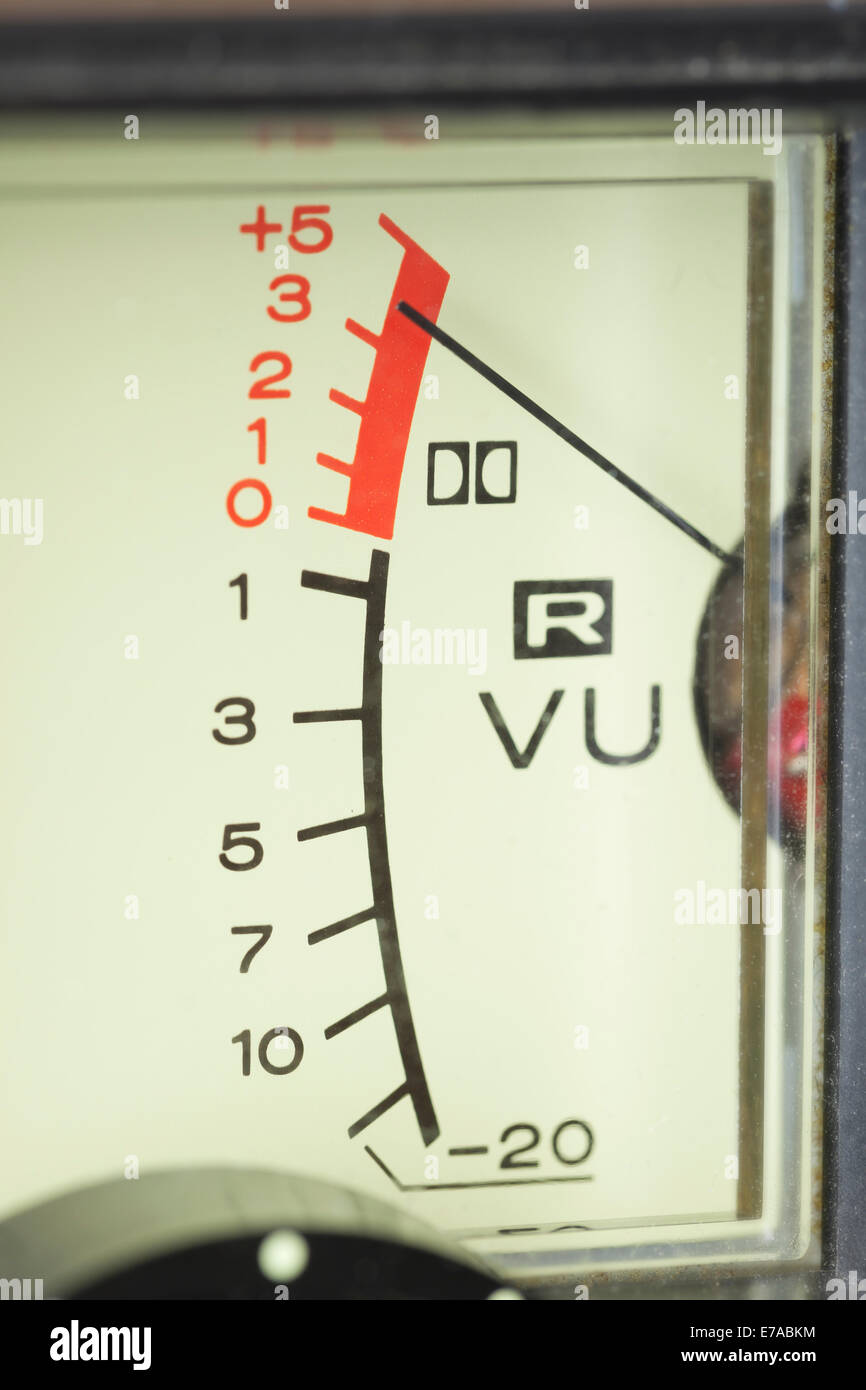 VU meter, audio signal volume unit, with needle in the red Stock Photo