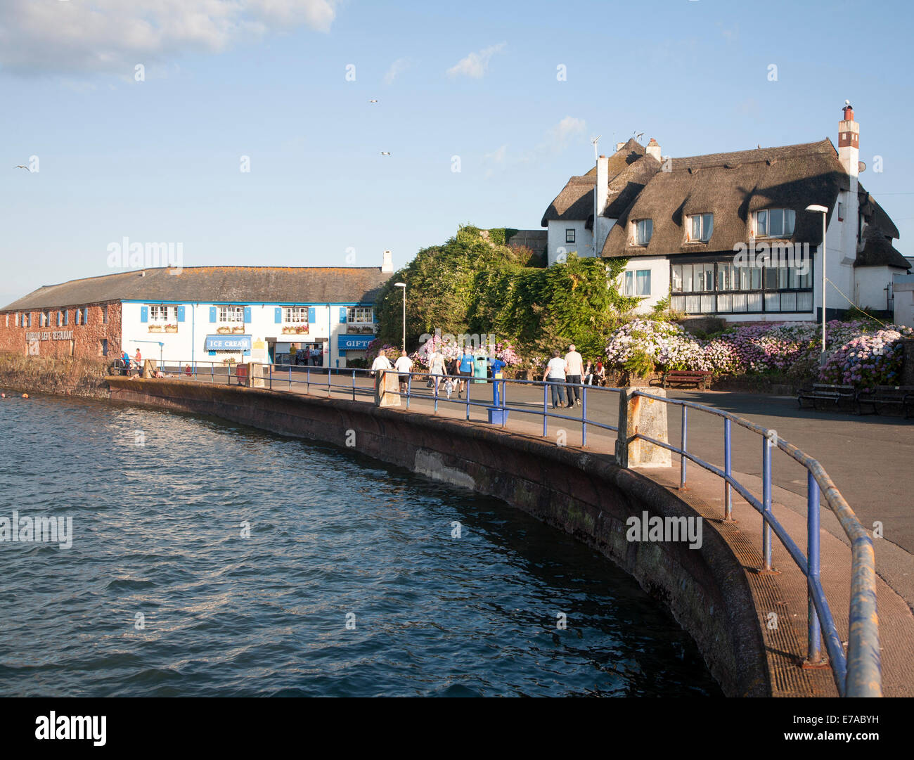 Thatched historic houses on the seafront at Paignton, Devon, England