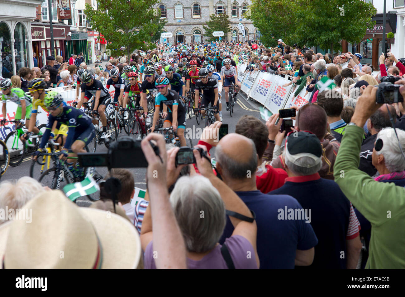 Exmouth, Devon. 11th September, 2014. Cyclists leaving Exmouth, Devon at the start of the Tour of Britain Stage 5. Credit:  Rob Cousins/Alamy Live News Stock Photo