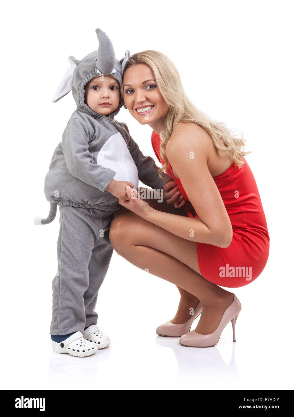 Elegant mom and baby dress as elephant over white background Stock Photo