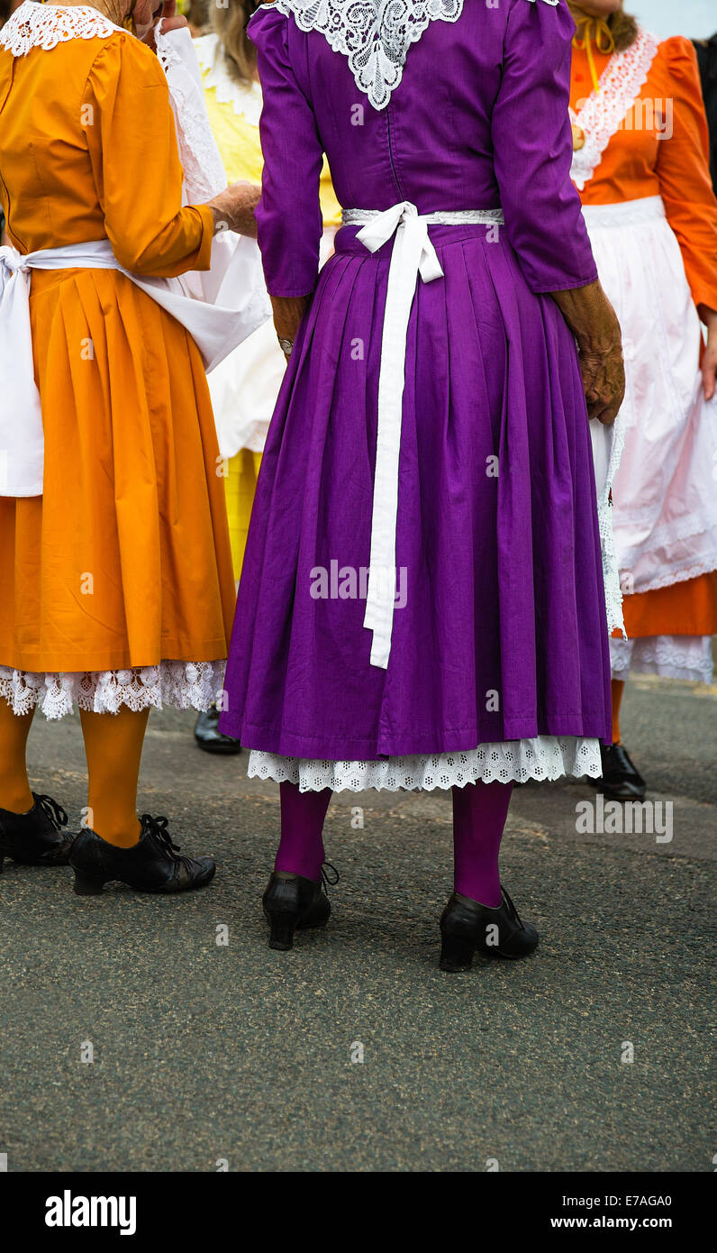 A group of women dressed in colouful costumes at a folk festival. Stock Photo