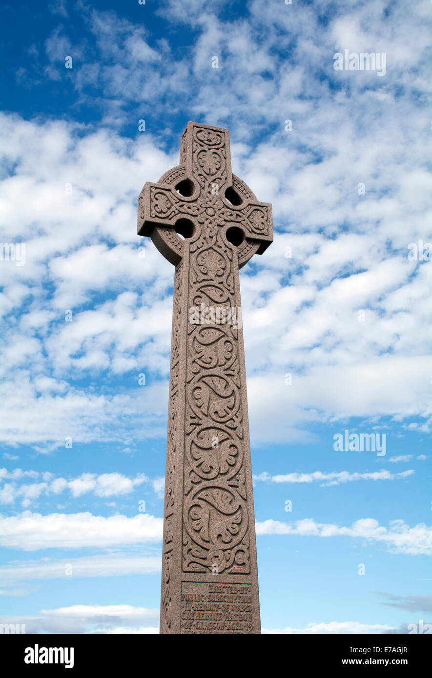 The carved stone celtic cross memorial near the harbour at North Berwick, Scotland. Stock Photo