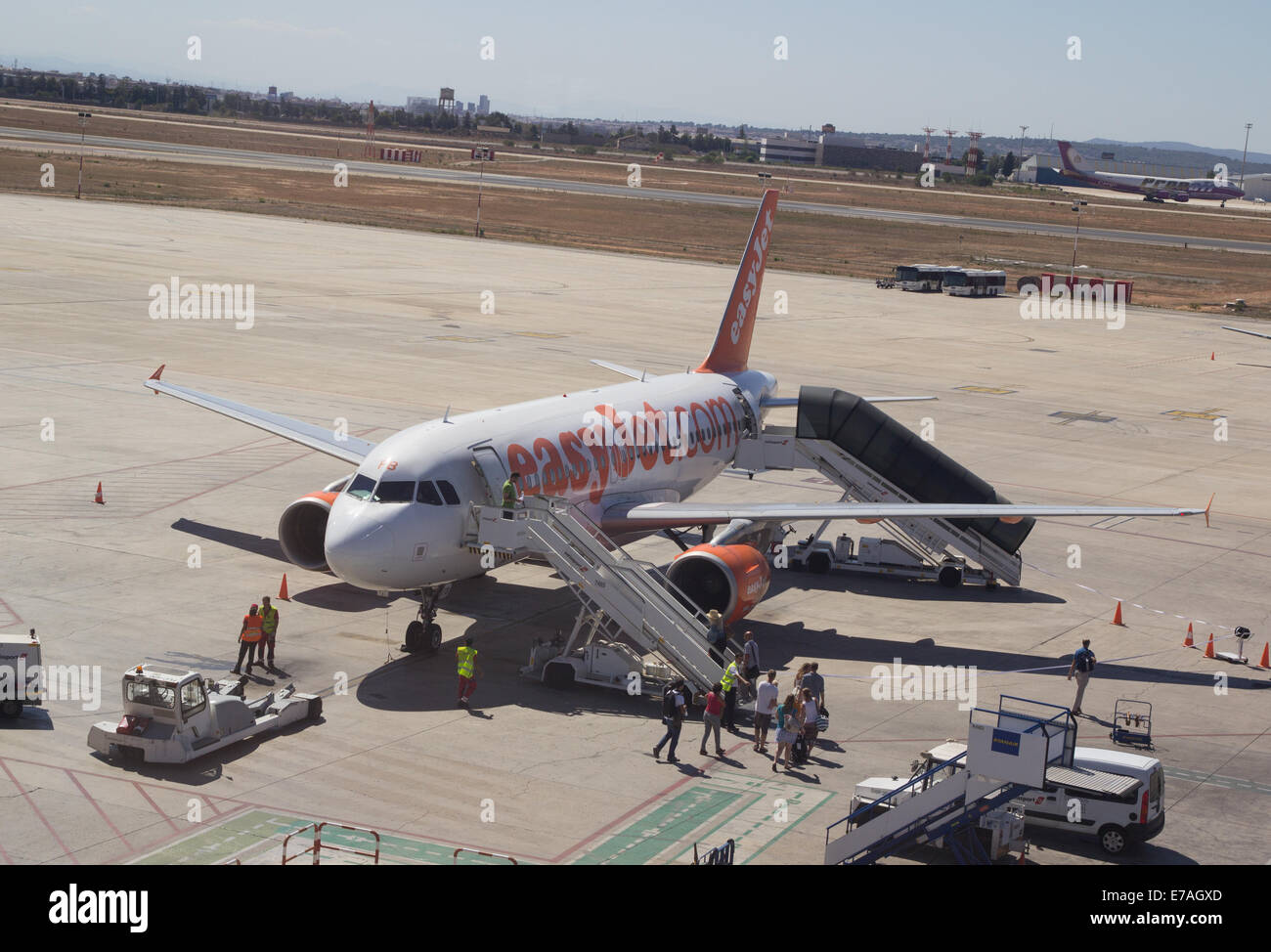 Valencia, Spain. 11th September, 2014. An EasyJet airliner at the Valencia Airport. EasyJet is a British airline carrier based at London Luton Airport.  It is the largest airline of the United Kingdom, by number of passengers carried, operating domestic and international scheduled services on over 600 routes in 32 countries. Stock Photo