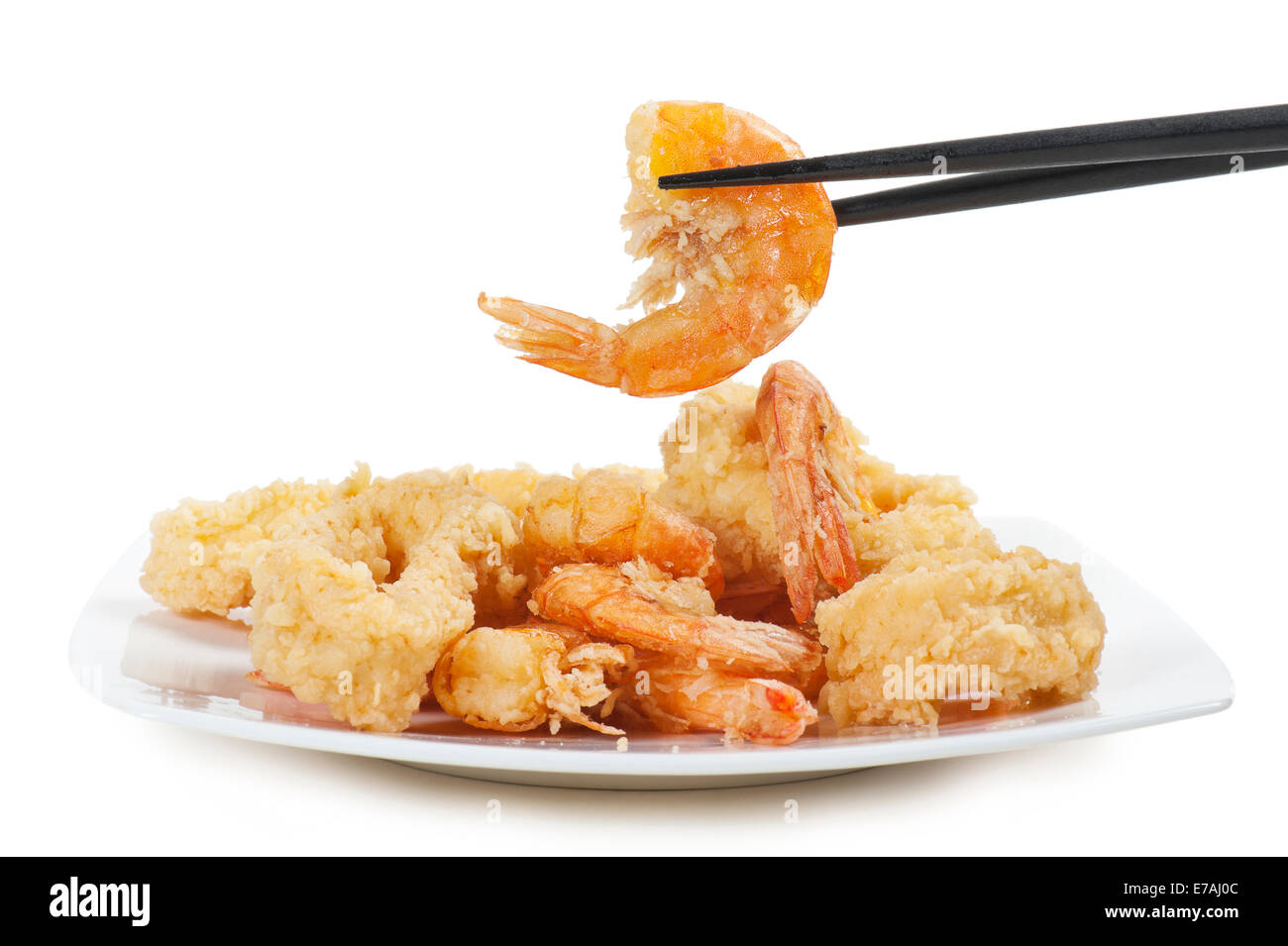 plate of fried fish on white background with chopsticks Stock Photo Alamy