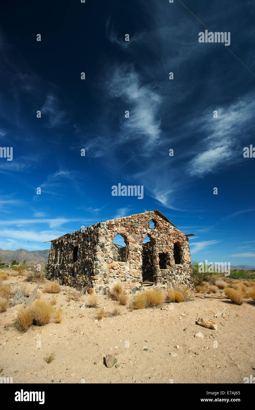 Old stone Church building or house shell in the desert USA Stock Photo