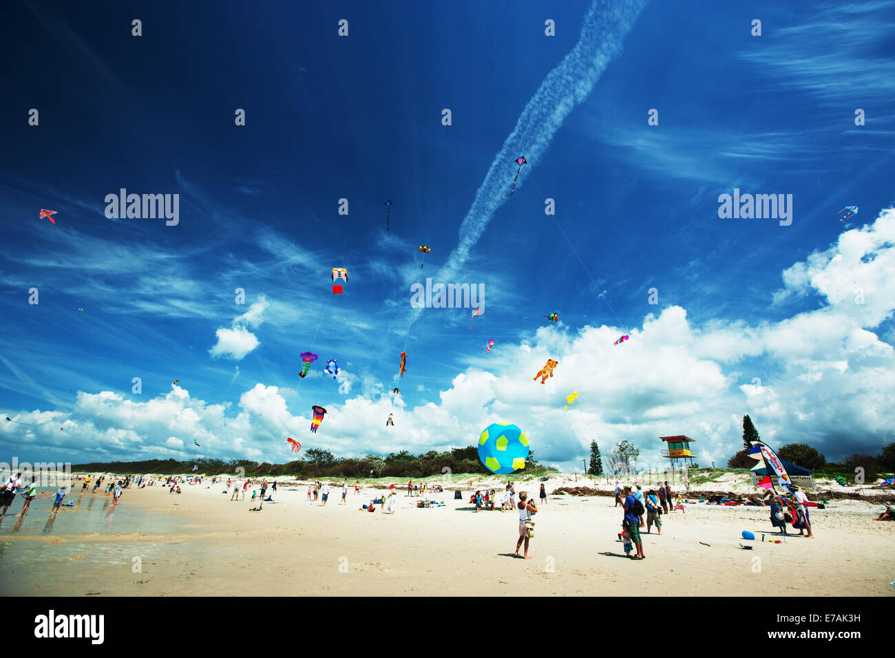 People  flying  kites on the beach, Queensland, Australia. Stock Photo