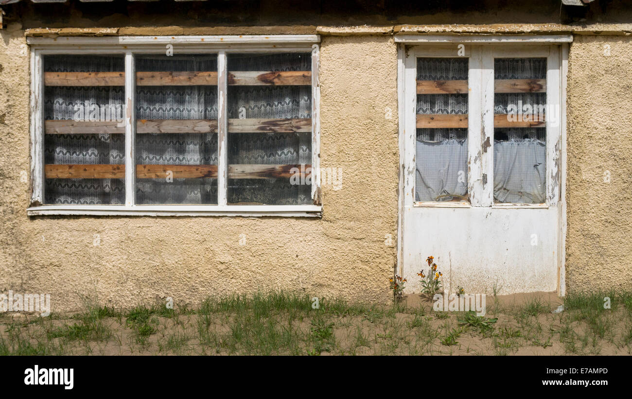 Empty Boarded up House, Camber Sands, Camber, East Sussex, Britain. Stock Photo