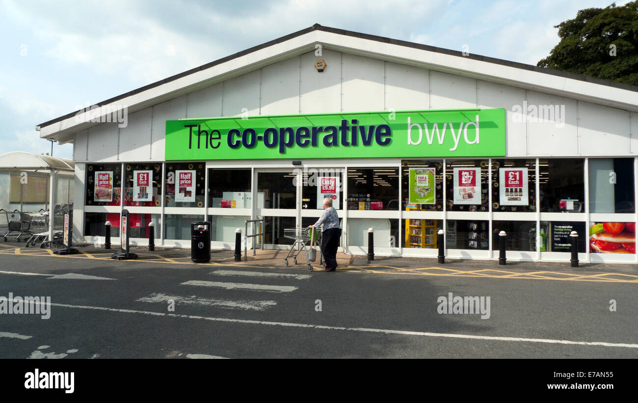 Customer entering Co-Operative Co Op supermarket Wales UK Europe KATHY DEWITT Stock Photo