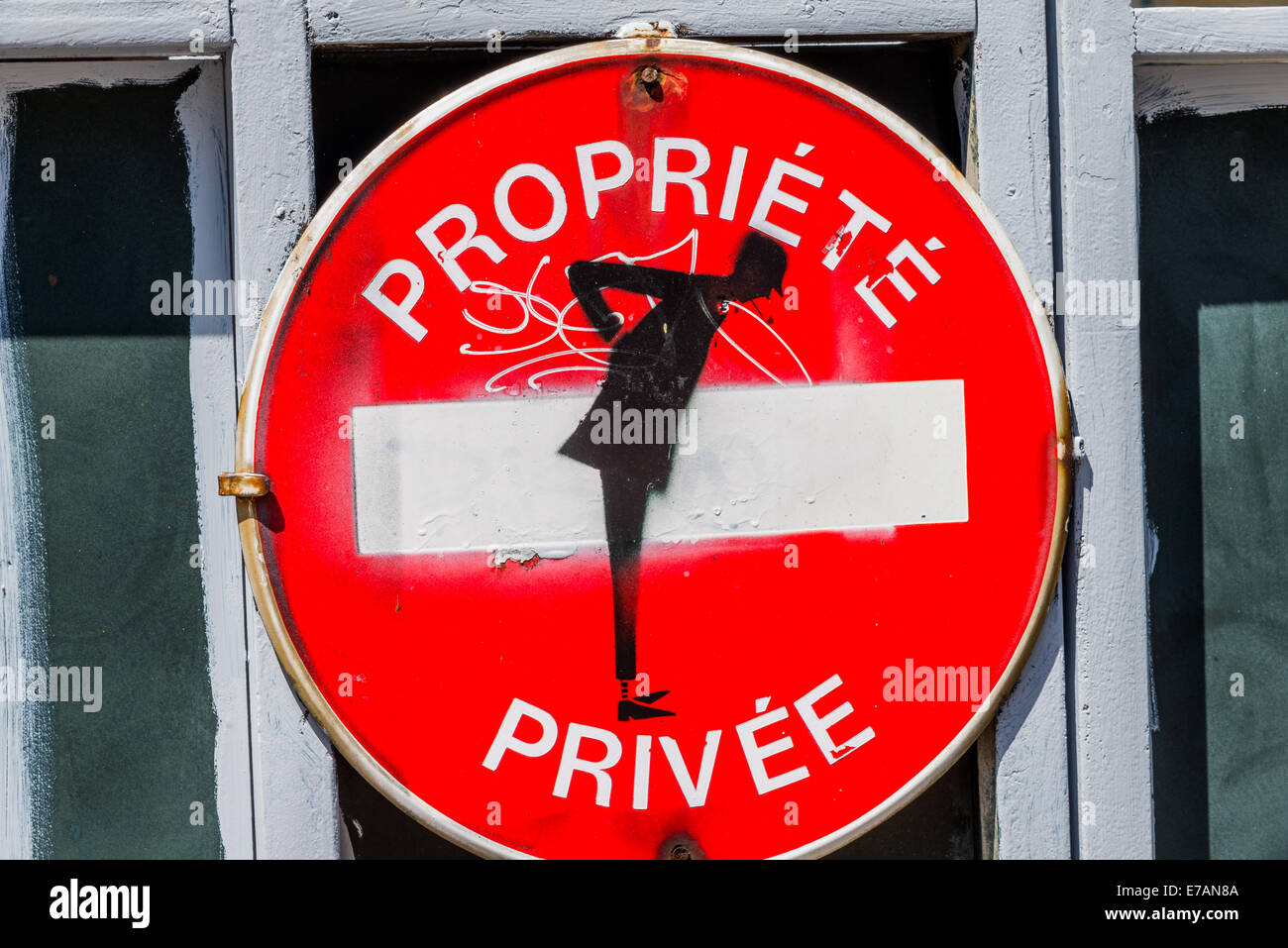 A propriete priveeprivate property sign with a black painted figure. Stock Photo