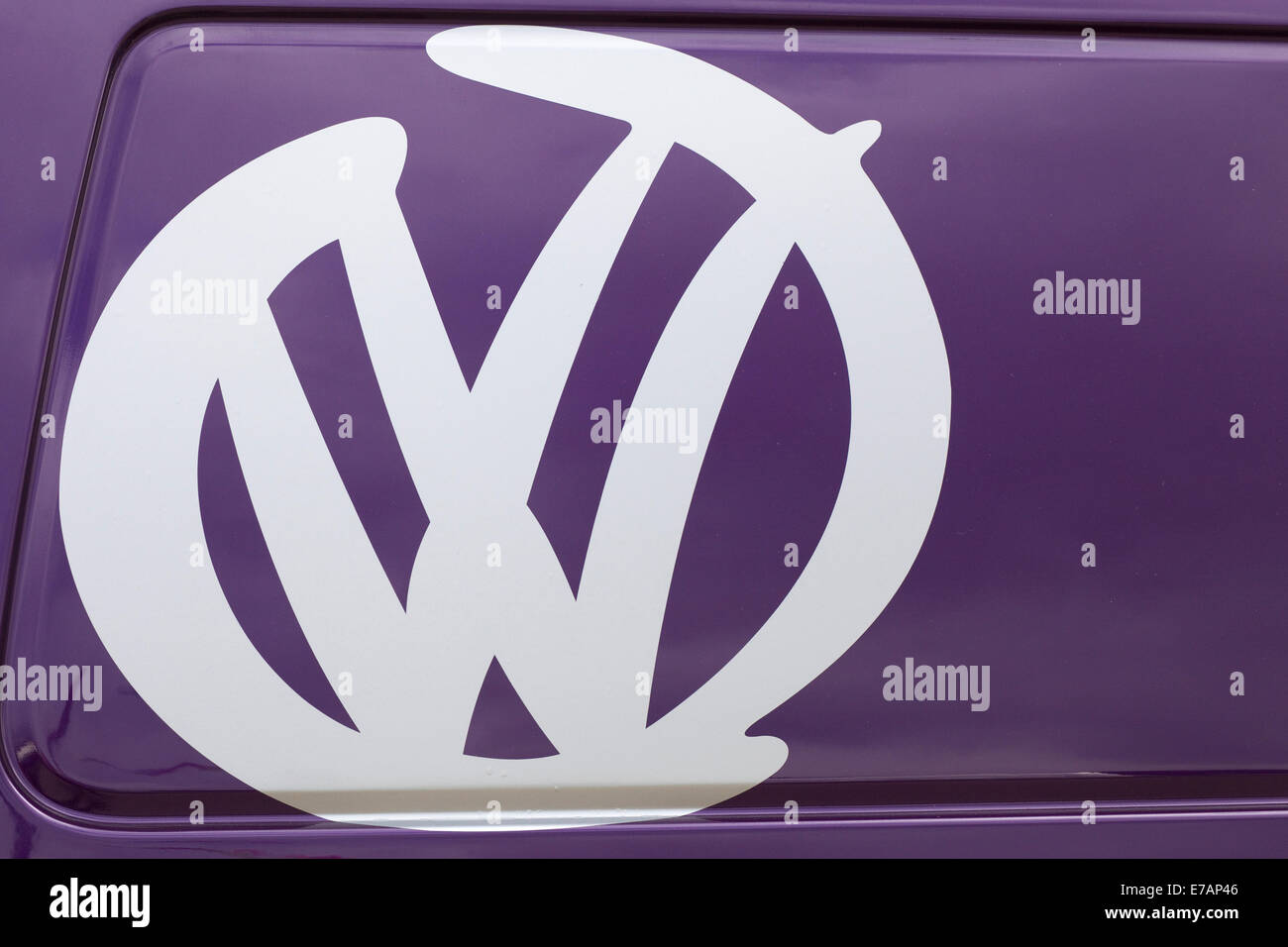 Spray painted VW on a Volkswagen camper van Stock Photo