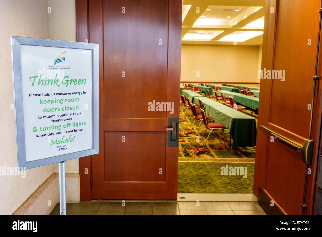 Hawaii,Hawaiian,Oahu,Honolulu,Convention Center,centre,interior inside,conference room entrance,sign,think green,conserve energy,keep doors closed tur Stock Photo