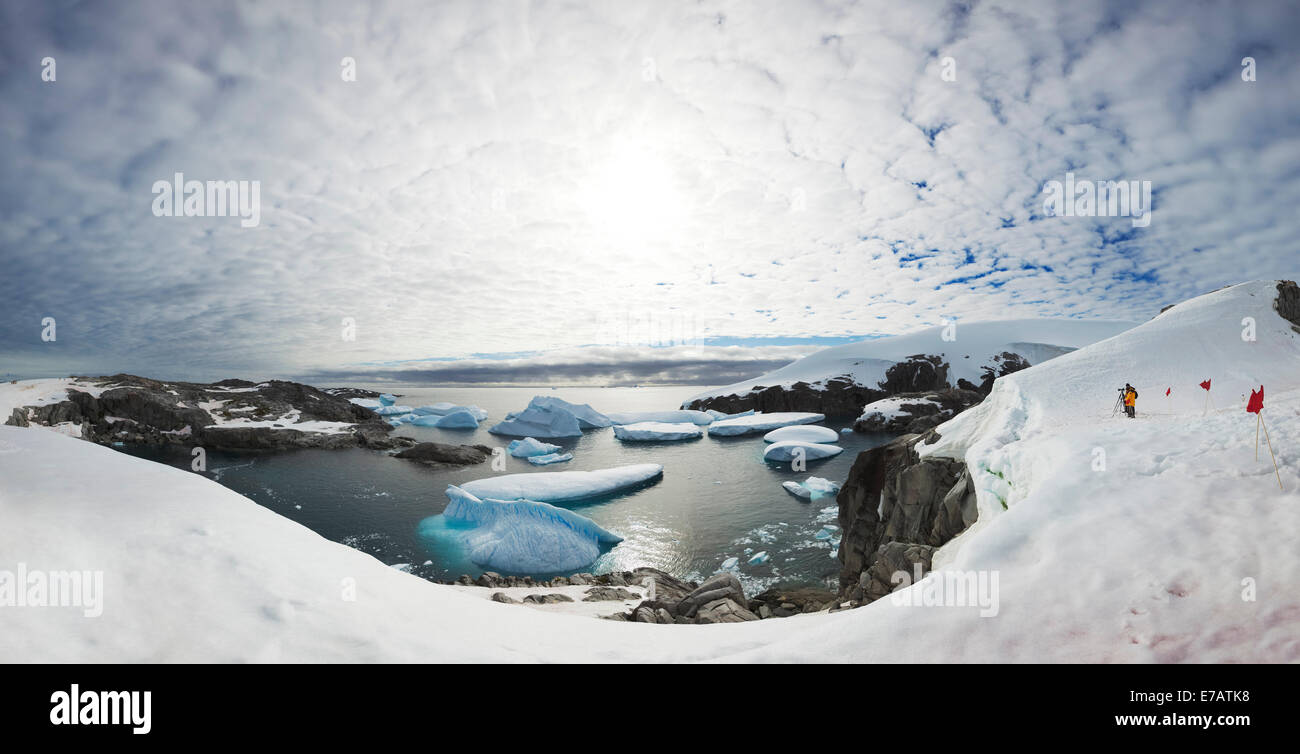 Icebergs floating on the shore of Petermann Island, Antarctic Stock Photo