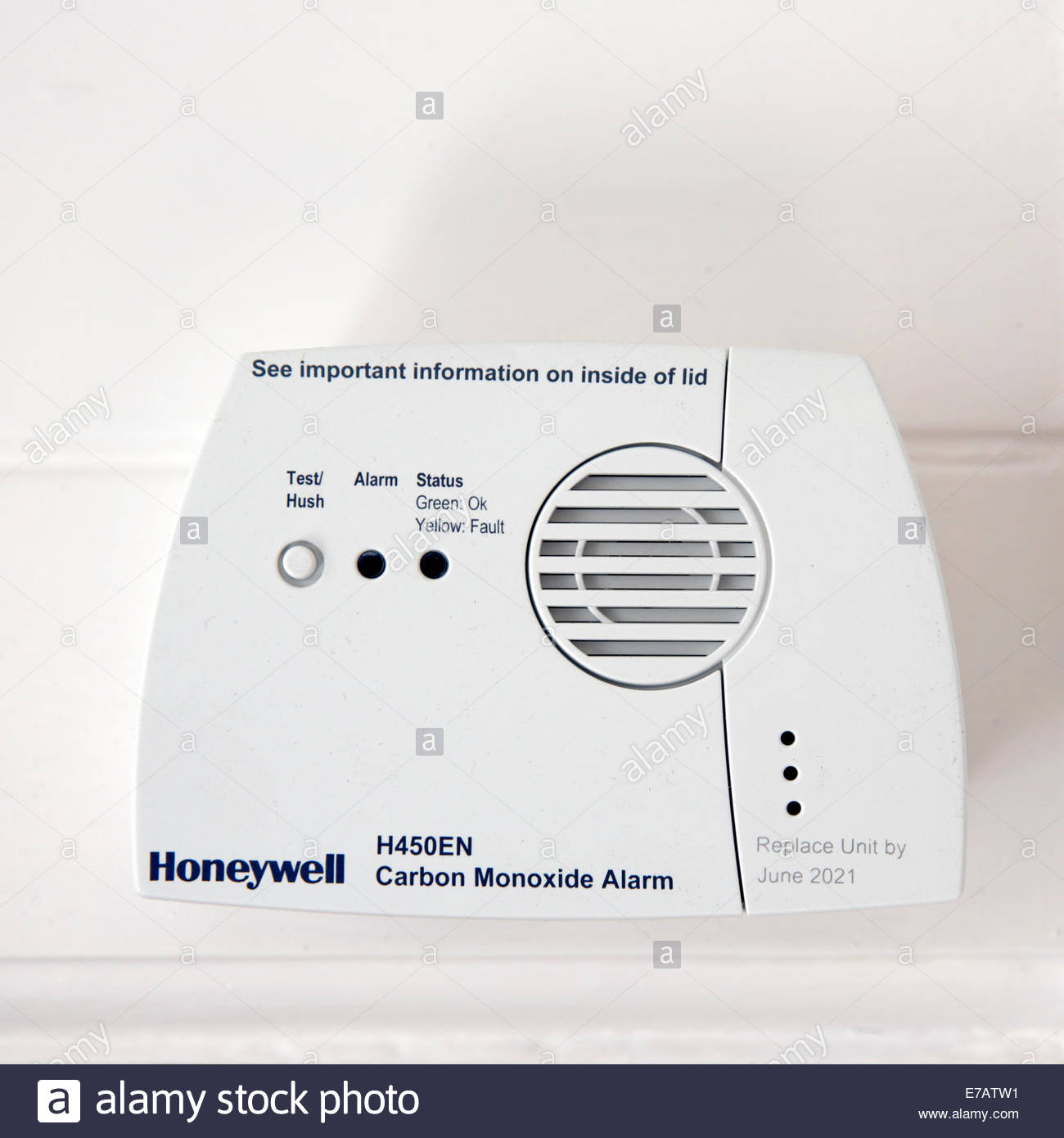 Carbon Monoxide detector attached to wall above Combi boiler Stock Photo