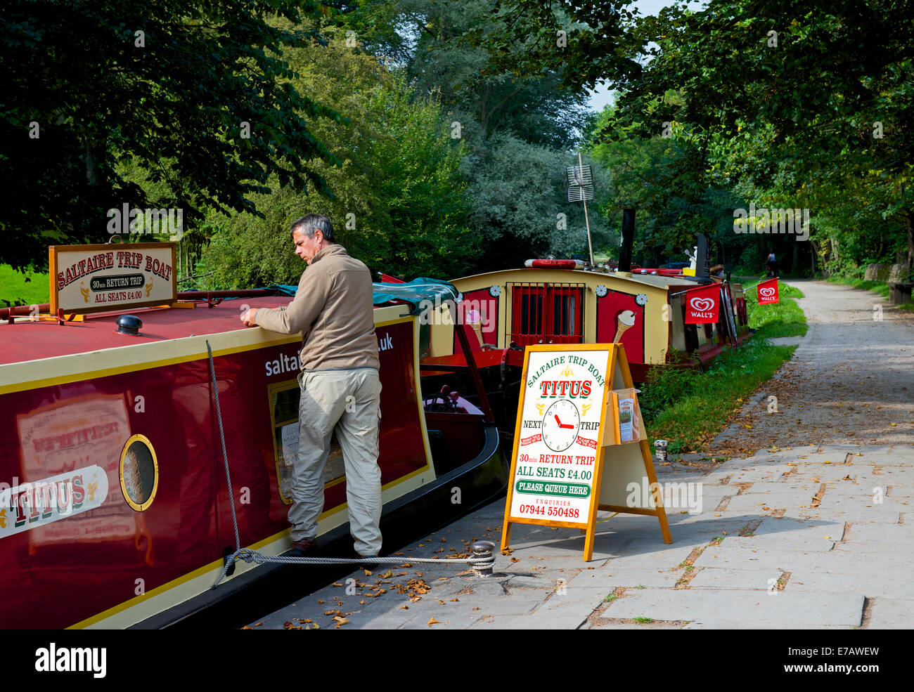Narrowboats on the Leeds and Liverpool Canal at Saltaire, near Bradford, West Yorkshire, England UK Stock Photo