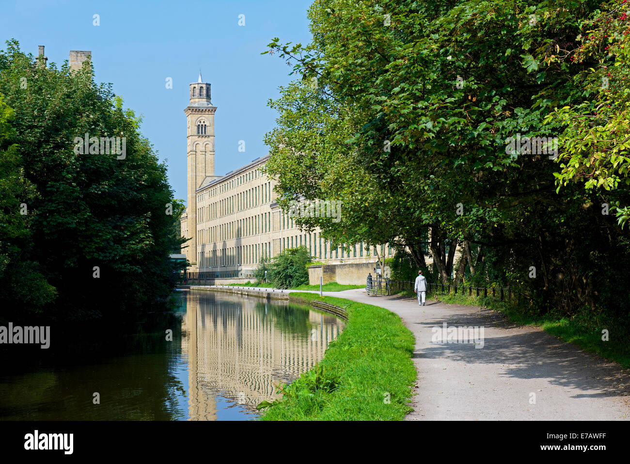 Salt's Mill and the Leeds & Liverpool Canal, Saltaire, West Yorkshire, England UK Stock Photo