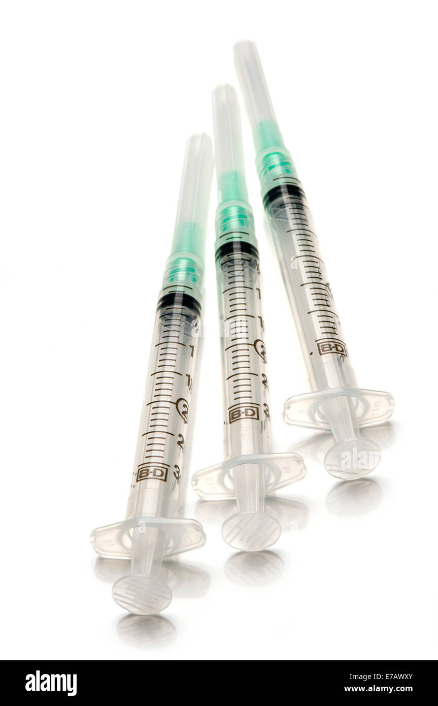 Medical syringes on white Stock Photo Alamy