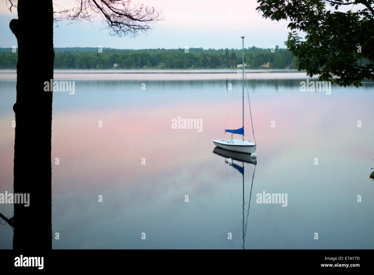 Sailboat moored on Toddy Pond at sunrise, Orland, Maine Stock Photo Alamy
