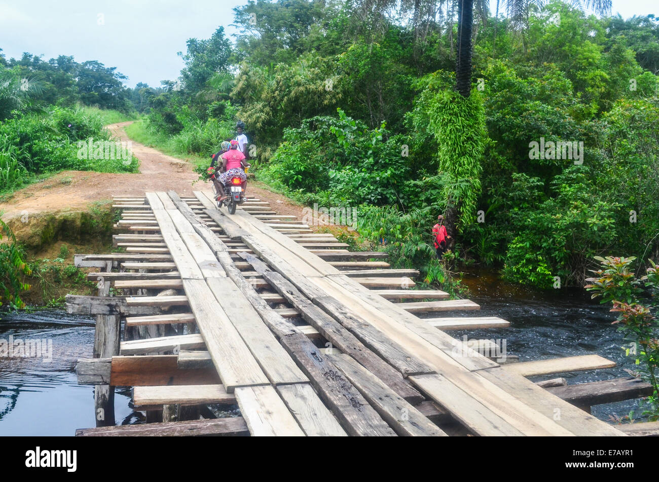 A wooden bridge in Liberia, close to Sawilo, about 20 km from the border with Sierra Leone Stock Photo