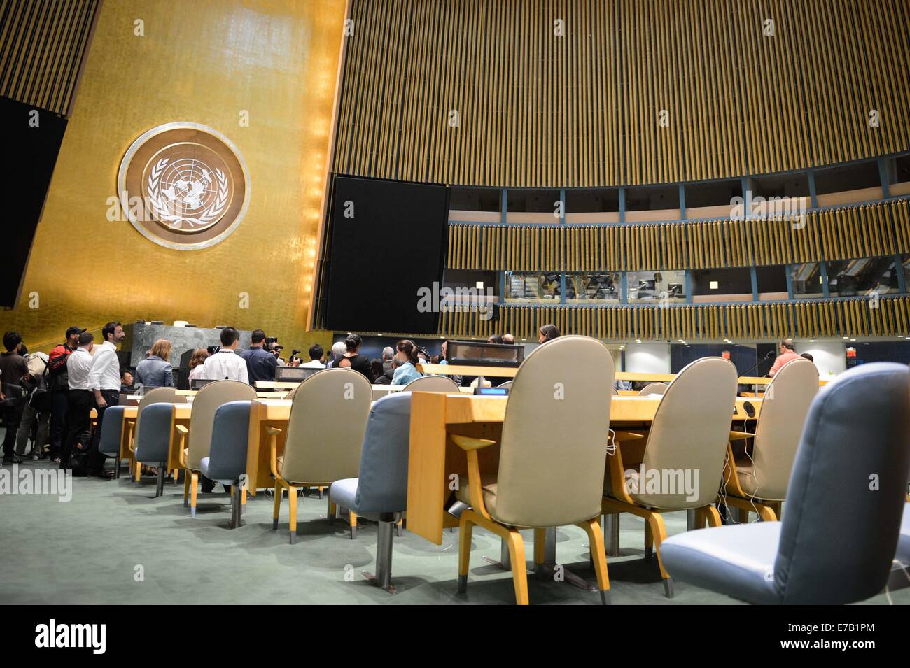 New York, USA. 11th Sep, 2014. Journalists take a guided tour at the renovated UN General Assembly hall in New York, on Sept. 11, 2014. The general debate of the UN General Assembly 69th Session will kick off here on Sept. 24. Credit:  Niu Xiaolei/Xinhua/Alamy Live News Stock Photo