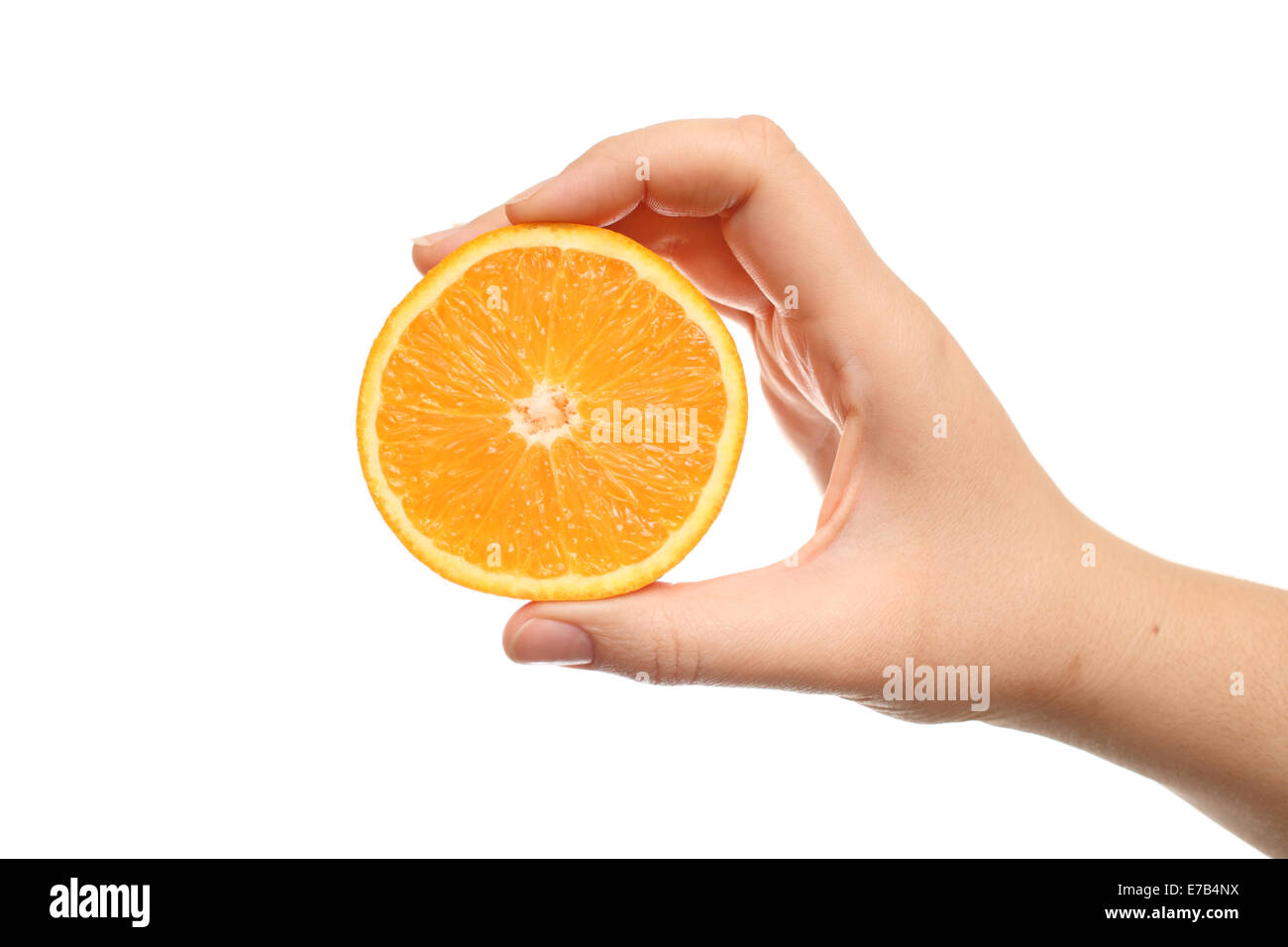 Hand holding half orange hi-res stock photography and images - Alamy