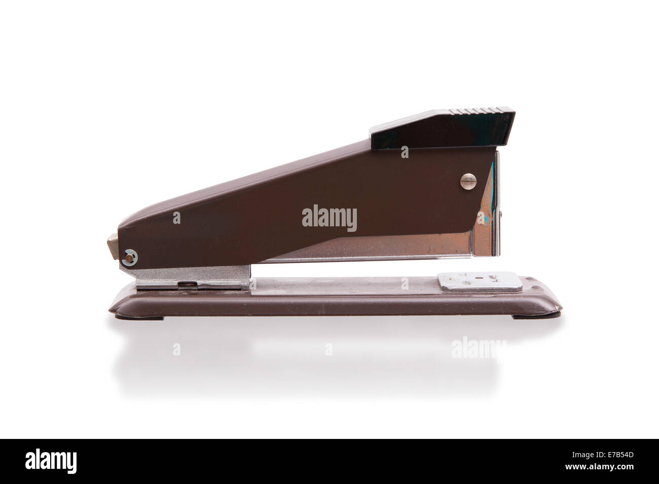 Old brown stapler on white back ground Stock Photo - Alamy