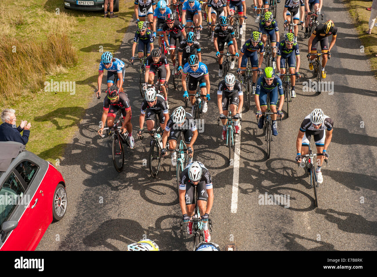 Exmouth, UK. 11th September, 2014. Tour of Britain Stage 5 Exmouth to Exeter. Lead group and Peloton climb Pork Hill, Dartmoor Credit:  Simon Stuart-Miller/Alamy Live News Stock Photo