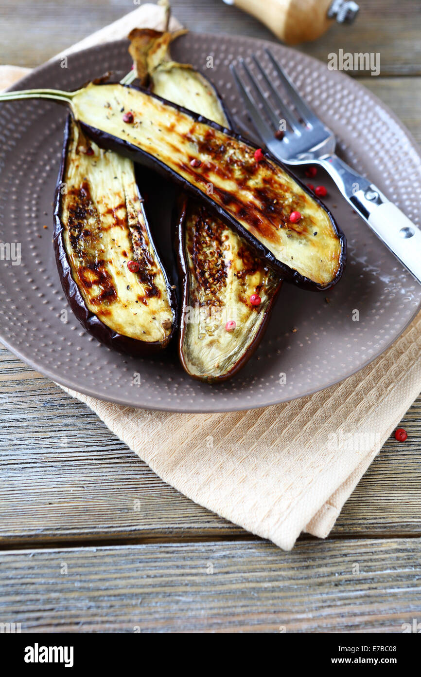 fried aubergine with spice on a plate, top view Stock Photo