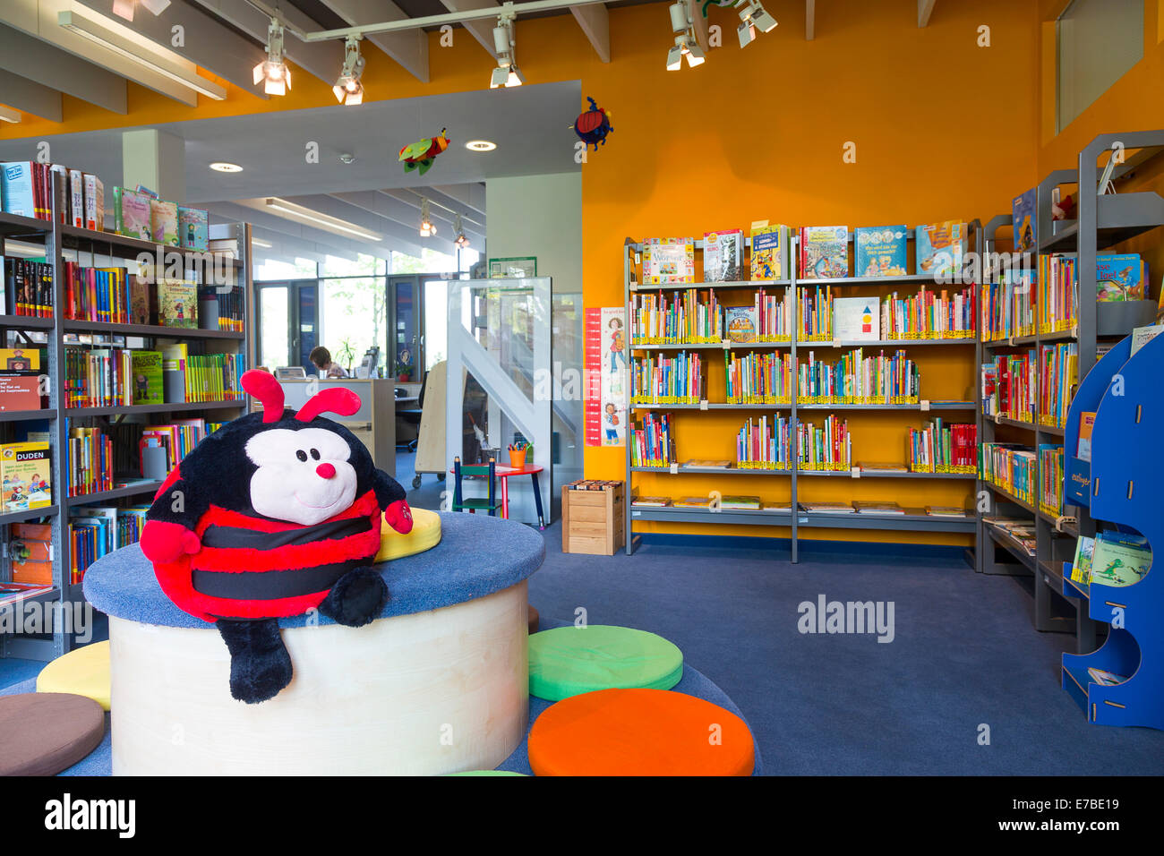 Bookshelves in the children's department, city library, Coswig, Saxony, Germany Stock Photo