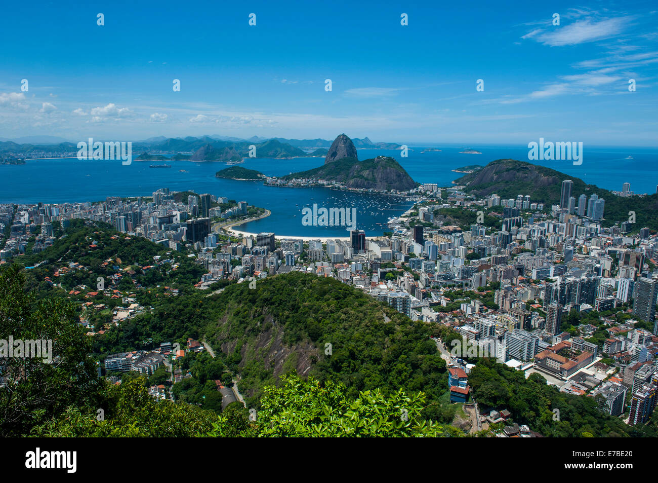 Outlook from the Christ the Redeemer statue over Rio de Janeiro and the Sugar Loaf, Brazil Stock Photo