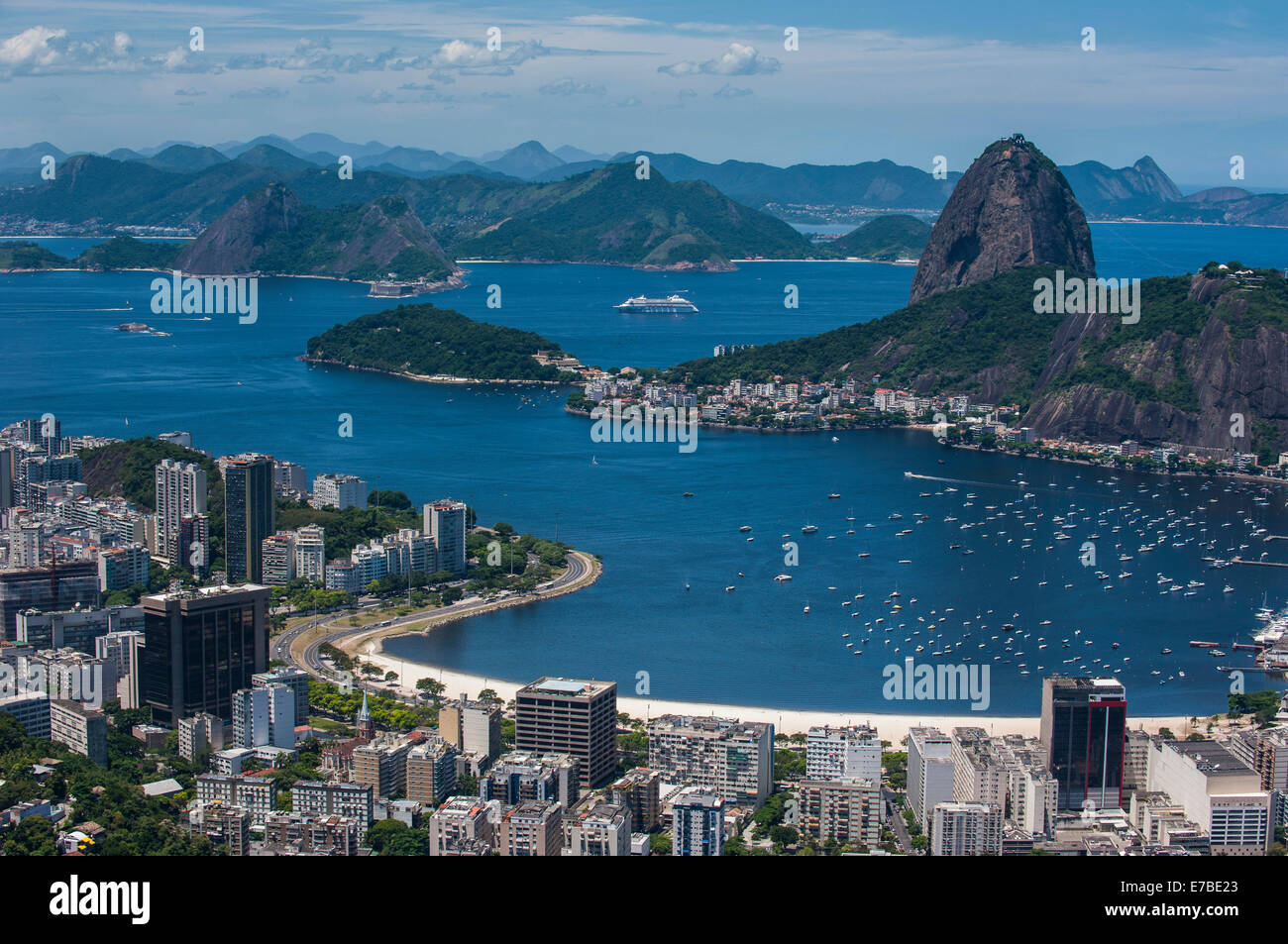 Outlook from the Christ the Redeemer statue over Rio de Janeiro and the Sugar Loaf, Brazil Stock Photo