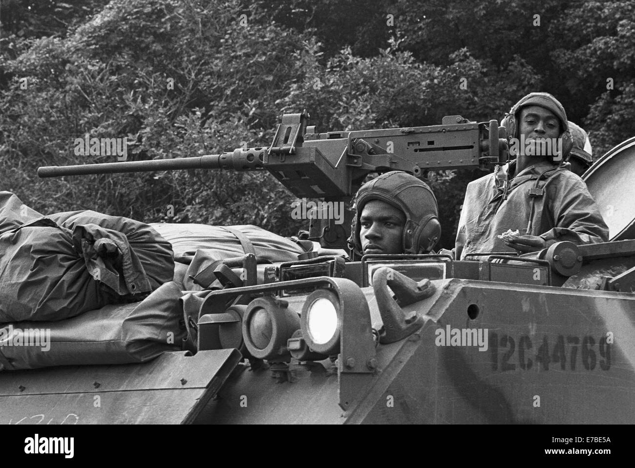 NATO exercises in the Netherlands, column of U.S. Army armored vehicles cross a village (October 1983) Stock Photo