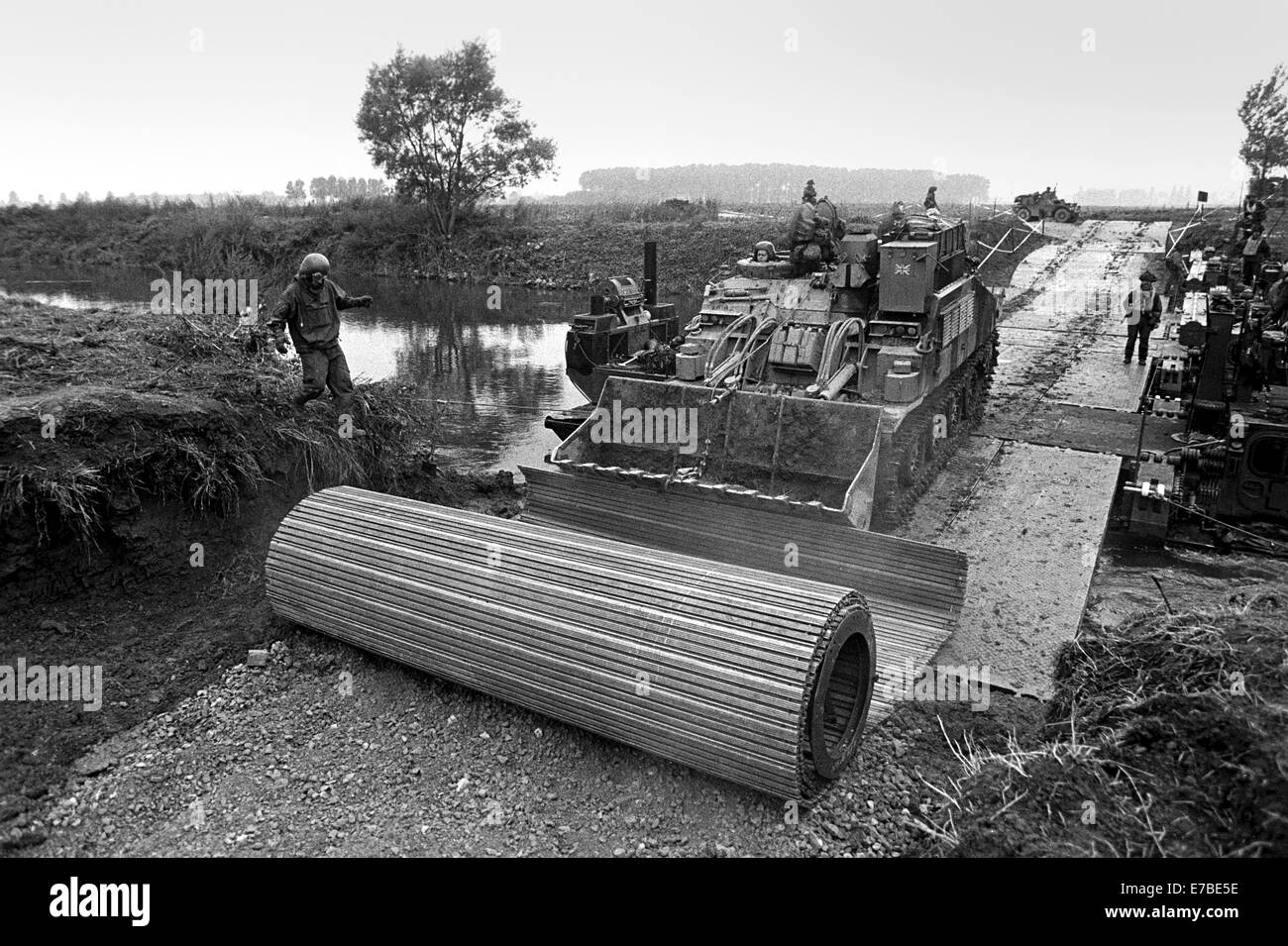 NATO exercises in Germany, British Army armored vehicles cross a pontoon bridge (September 1984) Stock Photo