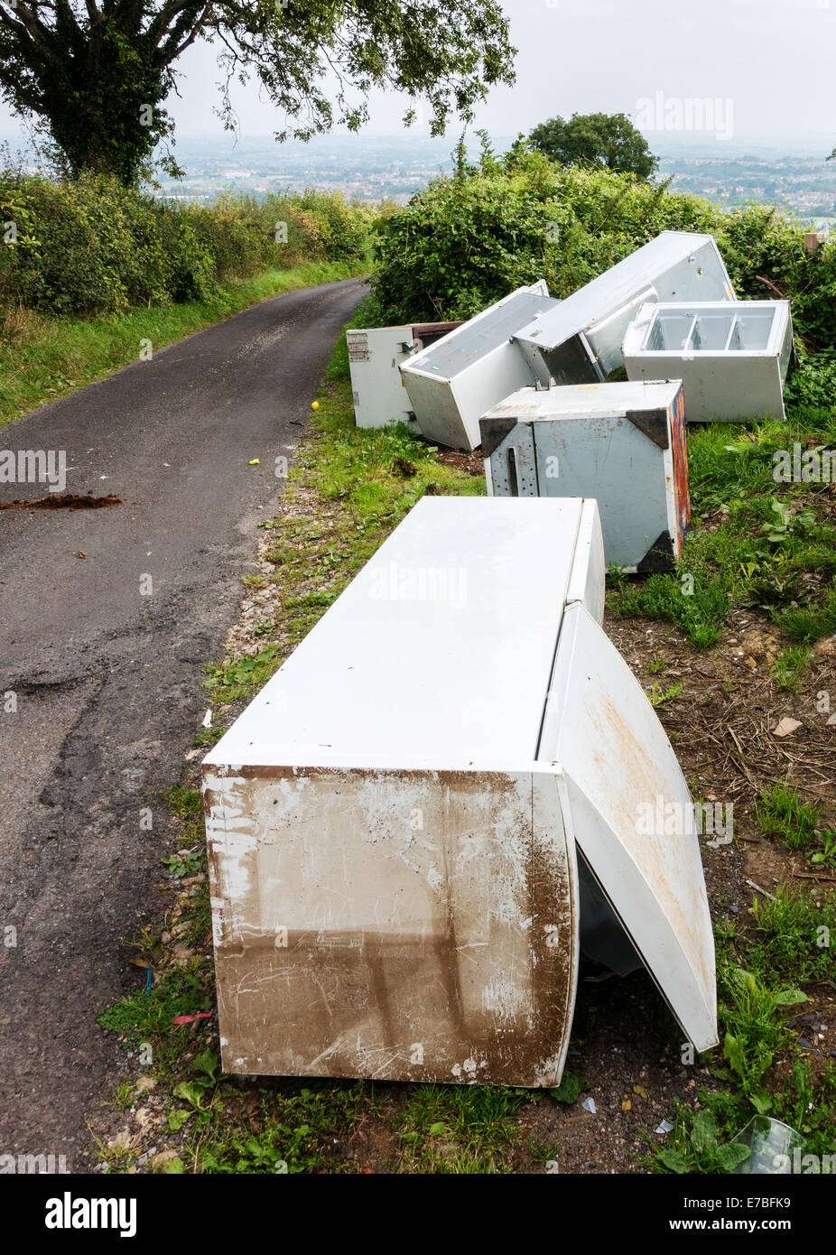 Fly tipping on an industrial scale in a quiet and otherwise pretty country lane near Bristol UK Stock Photo