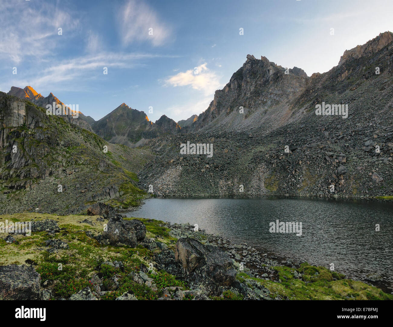 Early summer morning at the mountain lake. Sayan mountains. Republic of Buryatia. Stock Photo